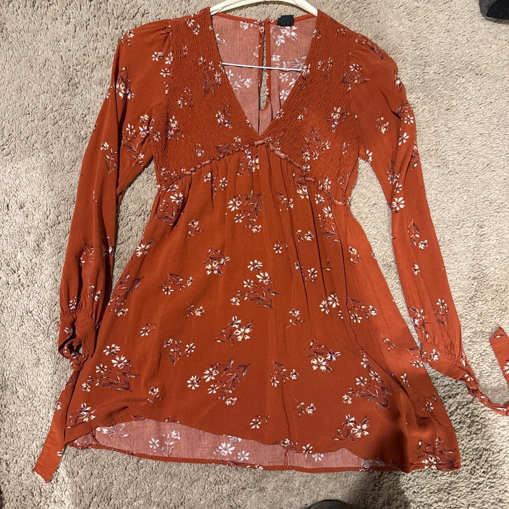 Burnt orange dress with white flowers
